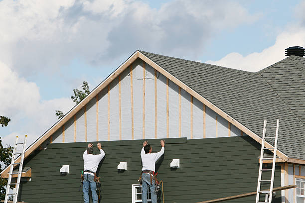 Professional Siding Contractor technician working in Hamburg, PA